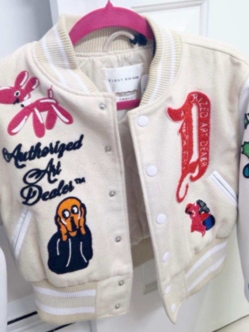 Kids' Cream Varsity Jacket with Colorful Patches